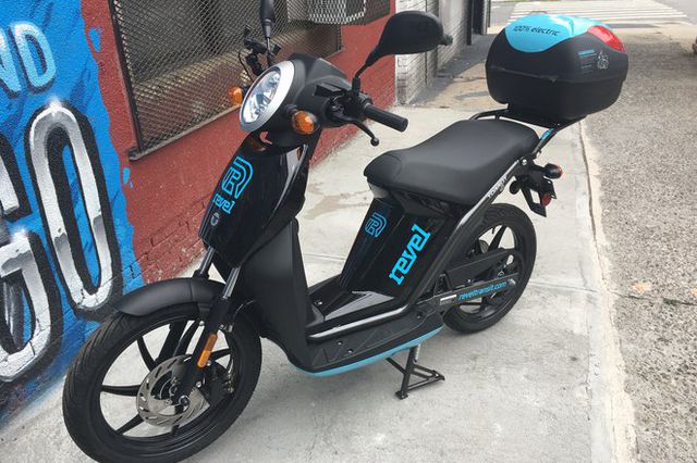 A photo of a Revel moped.